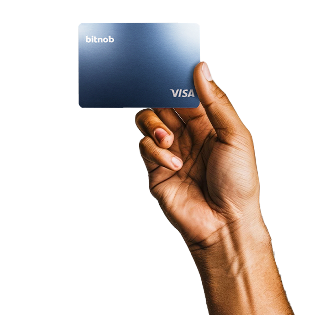 Hand with Bitnob Visa Card